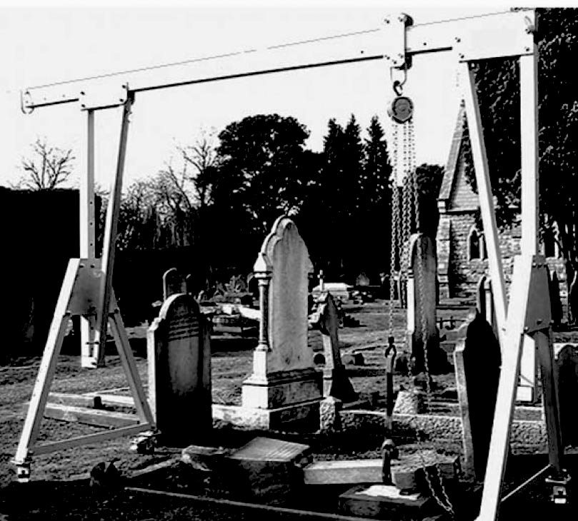 chain block on portable gantry in graveyard